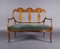 An Edwardian Inlaid Three Back Settee