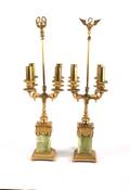 A Pair of Gilt Metal Onyx Mounted Four Light Candelabra