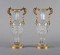 A Pair of Baccarat Gilt Metal Mounted Urns