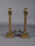 A Pair of Brass and Iron Andirons