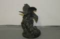 A Bronze Figure of an Eagle Battling a Cobra
