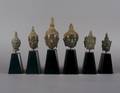 A Group of Six Thai Bronze Heads of Buddha