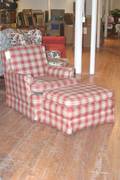 A Red Checkered Upholstered Armchair and Ottoman