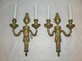 A Pair of Louis XVI Style Gilt Two Light Wall Sconces