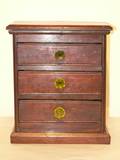 A Diminutive Chest of Drawers