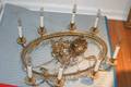 An Empire Style Brass Eight Light Chandelier
