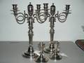 A Pair of Weighted Sterling Silver Candlesticks