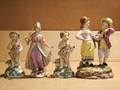 A Group of Four Continental Porcelain Figures