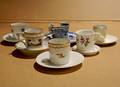 A Collection of Six Cups and Saucers