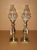 A Pair of Baluster Form Brass Candlesticks