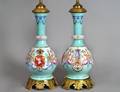 316 PAIR OF GILT BRONZE MOUNTED GLASS VASESLAMPS