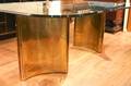 A Contemporary Brass and Glass Double Pedestal Dining Table