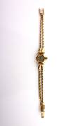 A Ladys Yellow Gold Wristwatch