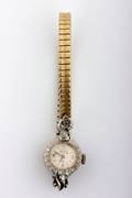 A Ladys 14 Karat White Gold and Diamond Wristwatch Elgin