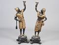 287 PAIR OF PATINATED AND GILT BRONZE BLACKAMOOR TORCH
