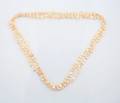 A Single Strand Necklace of Freshwater Keshi Pearls
