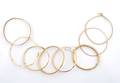 A Group of Seven Assorted Yellow Gold Bangles