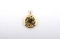 A 14 Karat Yellow Gold Floral Inscribed Locket