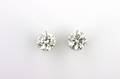 A Pair of 14 Karat White Gold and Diamond Stud Earrings