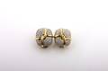 A Pair of 18 Karat Yellow Gold Platinum and Diamond Earclips