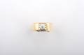 A 14 Karat Yellow Gold and Diamond Ring
