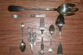 A Collection of Silver and Silverplate Flatware and Serving Articles