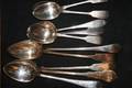 A Collection of Eleven English Silver Serving Spoons