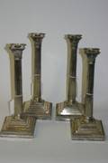 A Set of Four Columnar Form Silverplate Candlesticks