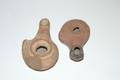 A Group of Two Greek Terracotta Oil Lamps