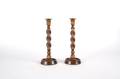 A Pair of Carved Wood Candlesticks