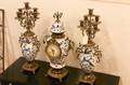 A Three Piece Delft Clock Garniture
