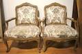 A Pair of Provincial Louis XV Style Upholstered Bergeres