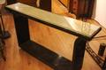 An Art Deco Style Ebonized Wood Console