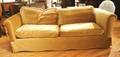A Beige Upholstered Sofa