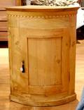 A Norwegian Bow Front Pine Corner Cupboard