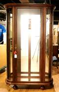 A Demilune Mahogany Curio Cabinet