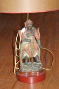 A Chinese Polychrome Painted Carved Wood Figure of a Guardian