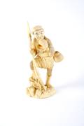 A Japanese Ivory Figure of a Fisherman