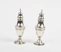 A Near Pair of George III Silver Casters London