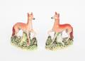 A Pair of Staffordshire Figures of Hunting Dogs
