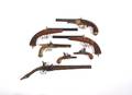 A Collection of Seven Pistols