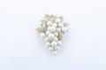 A 14 Karat Yellow Gold Cultured Pearl Diamond and Emerald Brooch