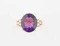 A 14 Karat Yellow Gold Amethyst and Diamond Ring