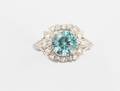 A 14 Karat White Gold Diamond and Blue Zircon Ring