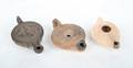 Three Roman Terra Cotta Oil Lamps