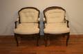 A Pair of Louis XV Provincial Fauteuils
