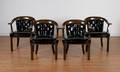 A Set of Four Barrel Back Arm Chairs