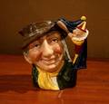 A Royal Doulton Character Mug of Punch and Judy Man