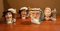 A Group of Four Royal Doulton Character Mugs