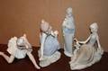 A Group of Four Lladro Bisque Porcelain Figures